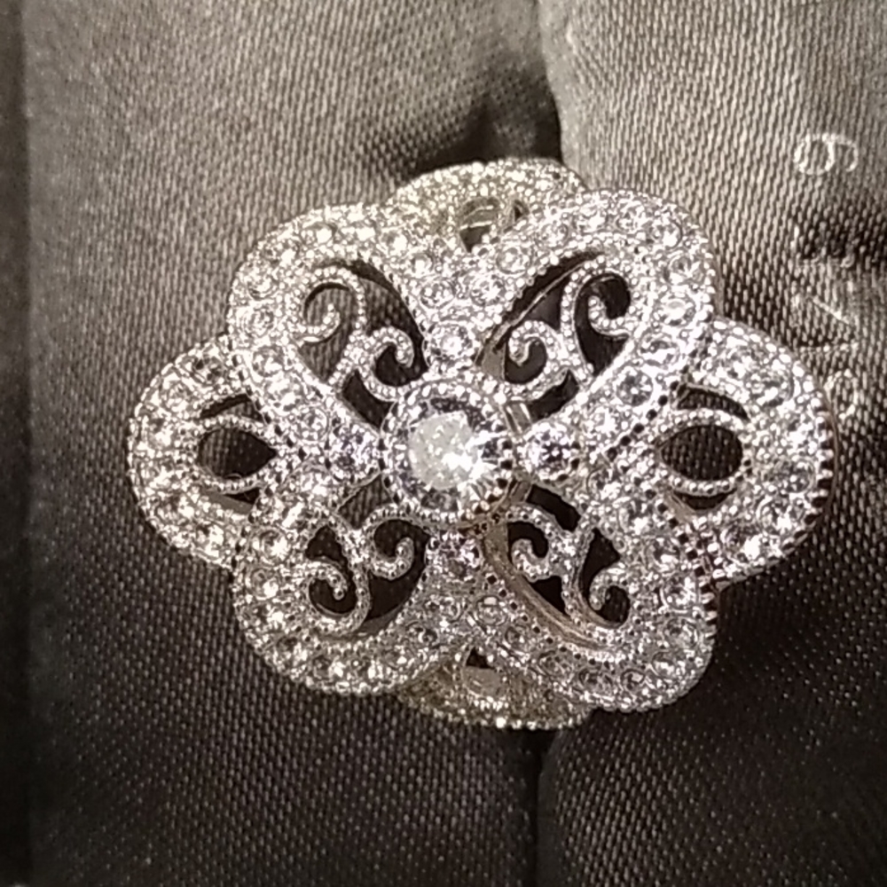 New w tags, size 9, silver color, beautiful ring